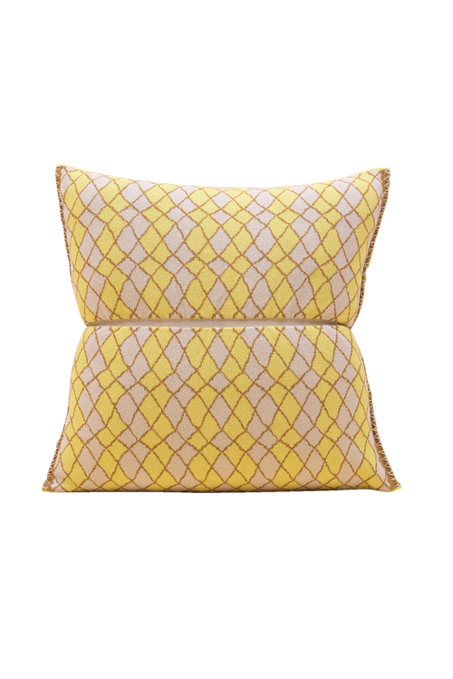 front side of yellow bow-shaped knit pillowcase with romb pattern in viscose