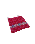 front view of red/pink knit checkered seat cushion with upcycled materials