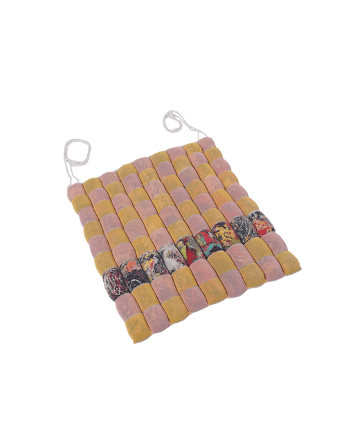front view of yellow/pink knit checkered seat cushion with upcycled materials