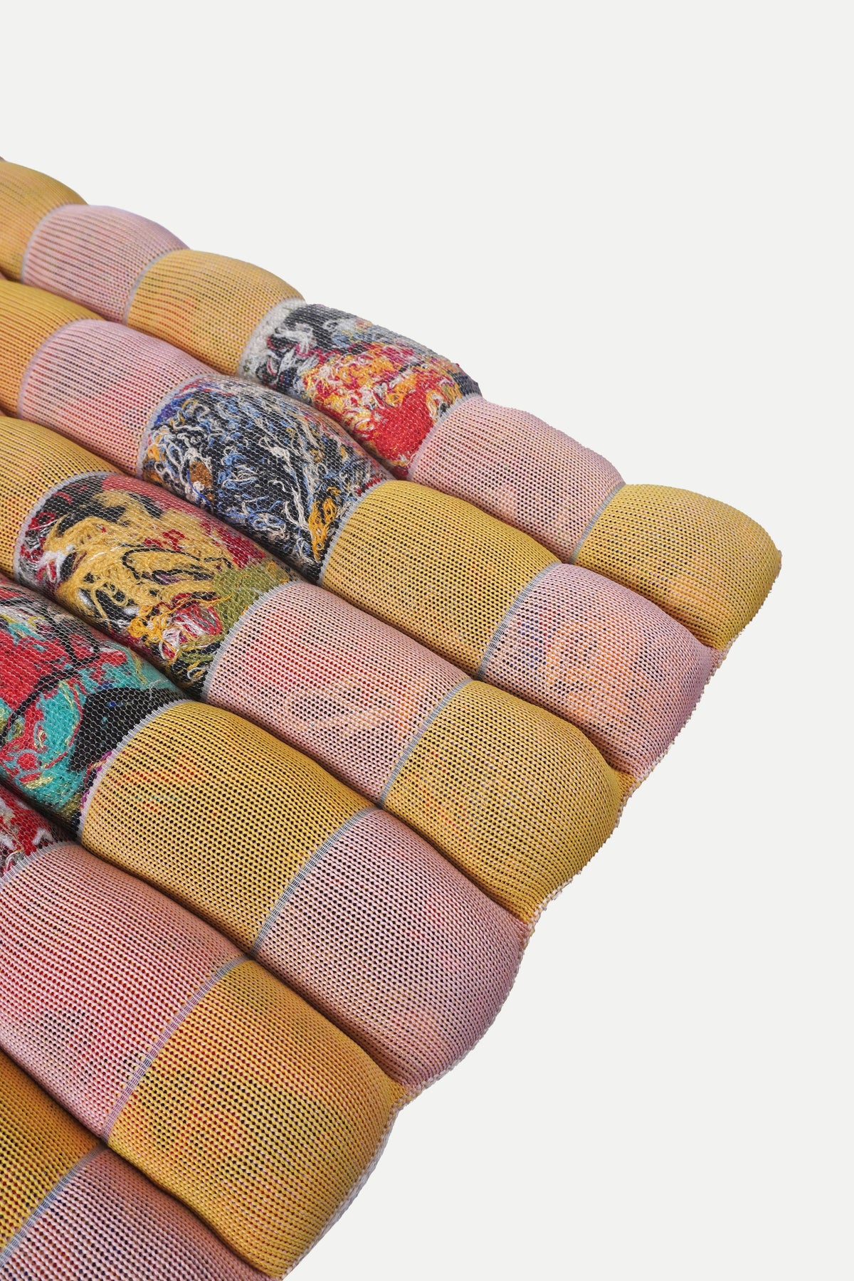 [yellow/pink] full view of the yellow and pink checkered knit seat cushion with tie straps
