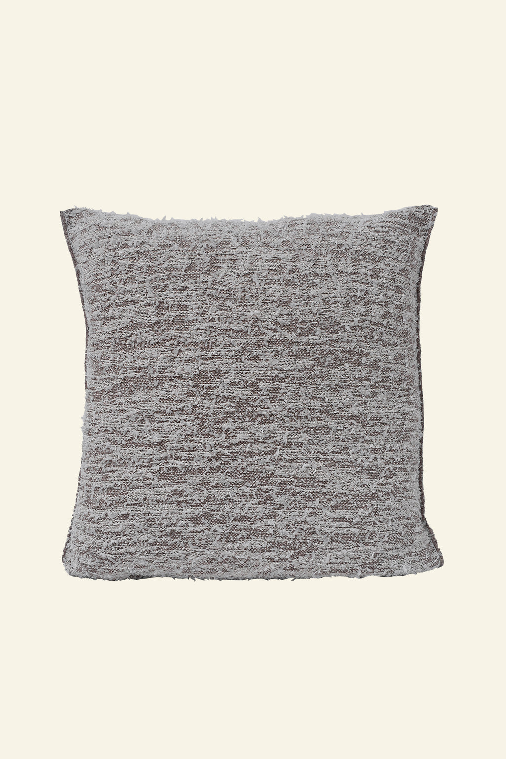 front side of beige fuzzy knit pillowcase in organic cotton and recycled polyamide on beige background