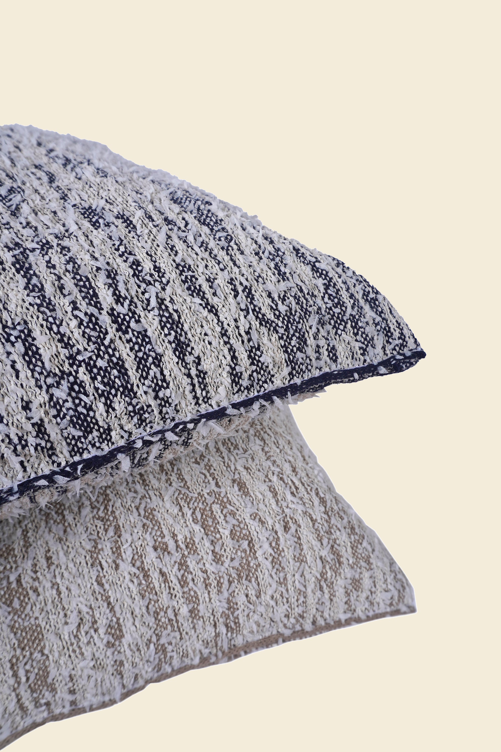 close-up of navy fuzzy knit pillowcase in organic cotton and recycled polyamide