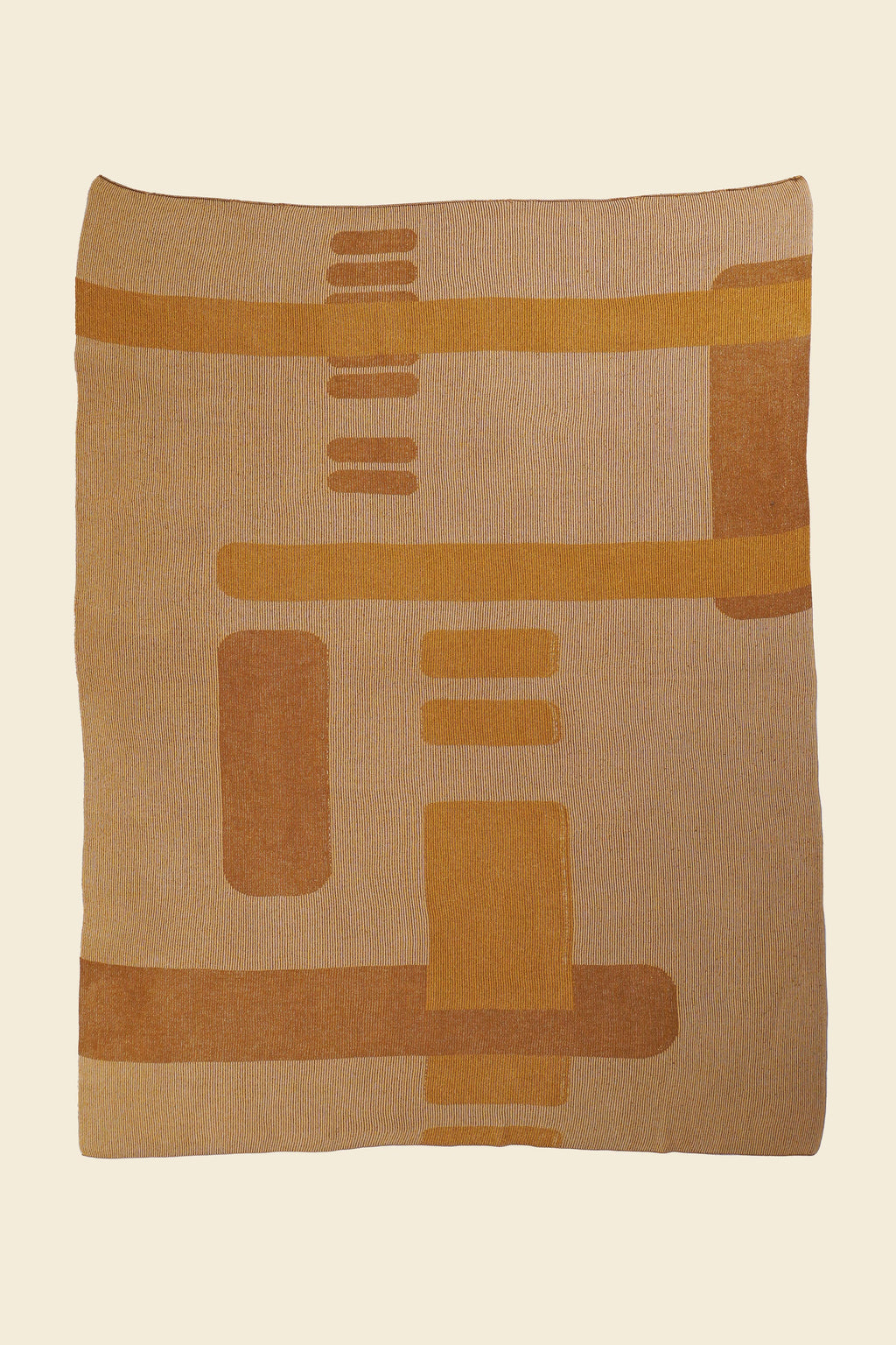 laid flat ochre geometric column knit blanket in merino wool and organic cotton