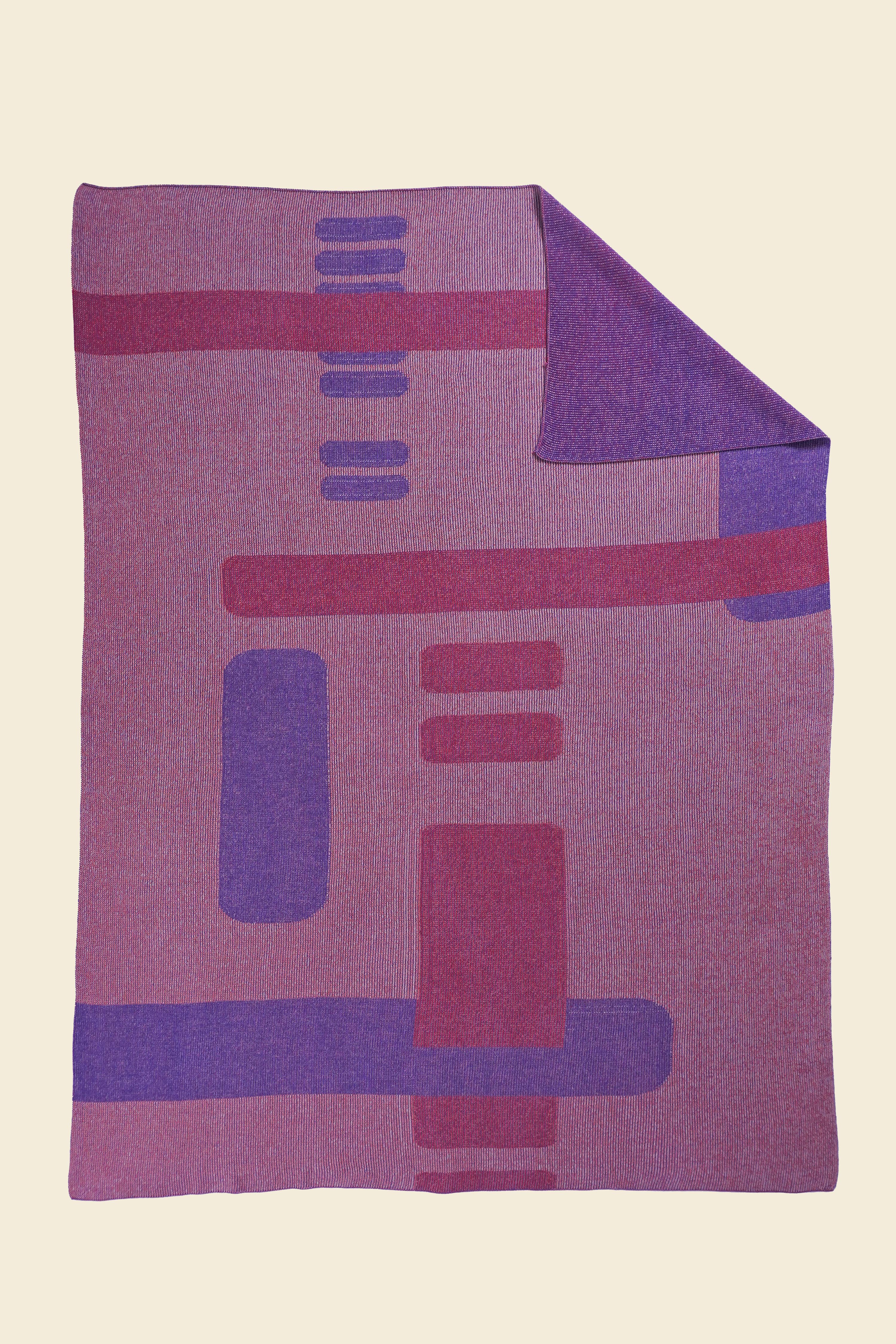 pink geometric column knit blanketwith flipped corner in merino wool and organic cotton