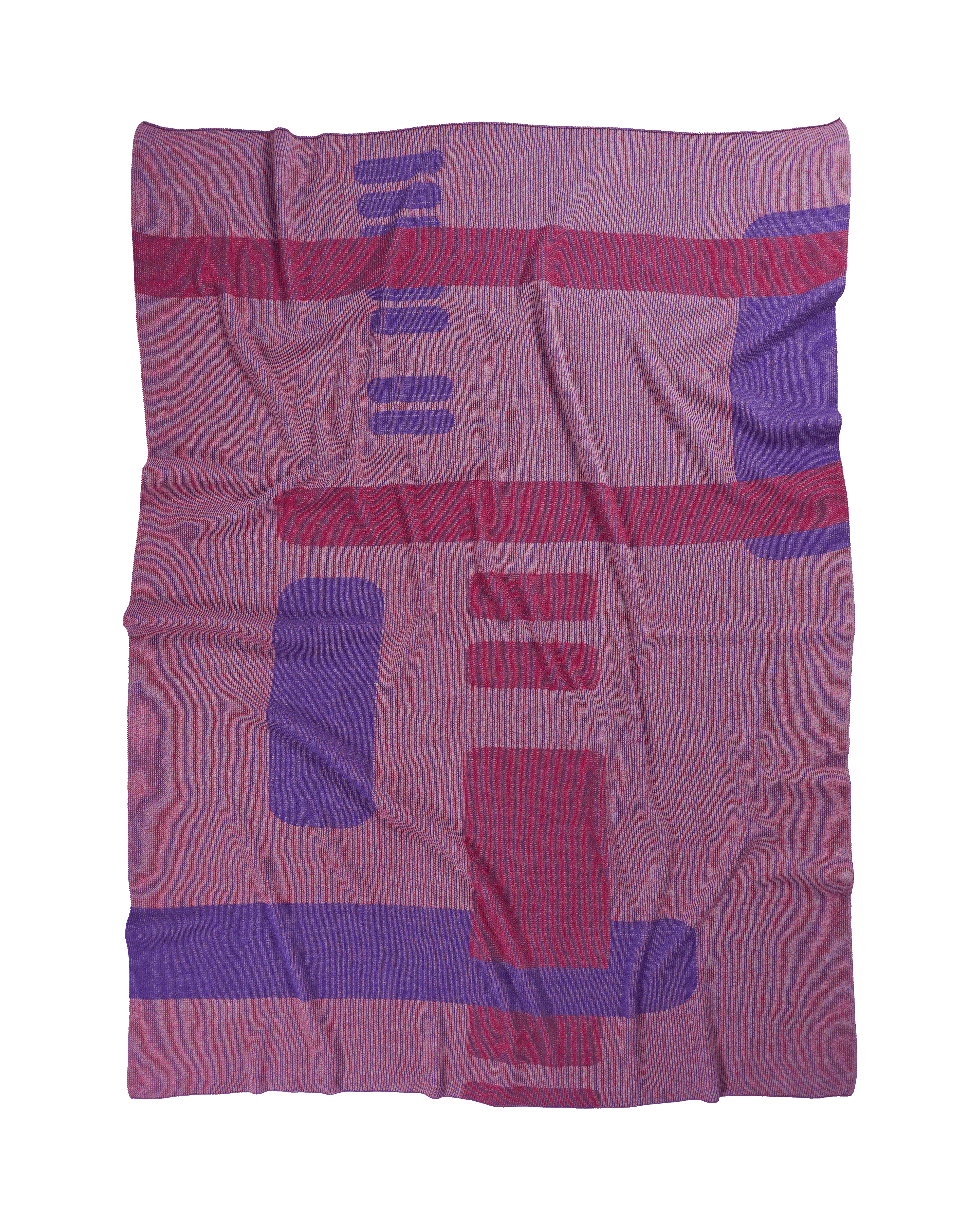 front side of pink geometric column knit blanket in merino wool and organic cotton