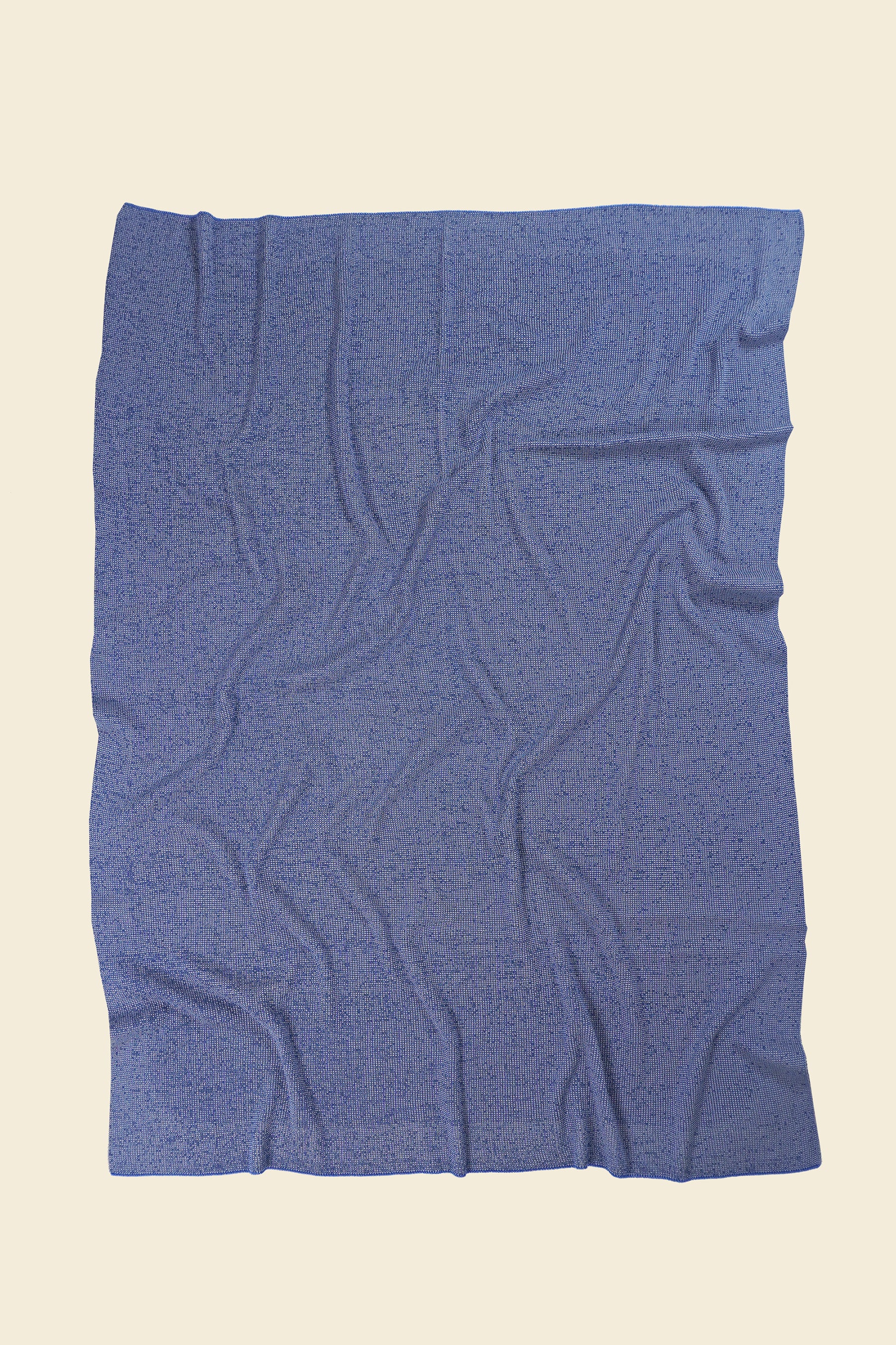 back side grey/blue knit blanket in merino wool and organic cotton