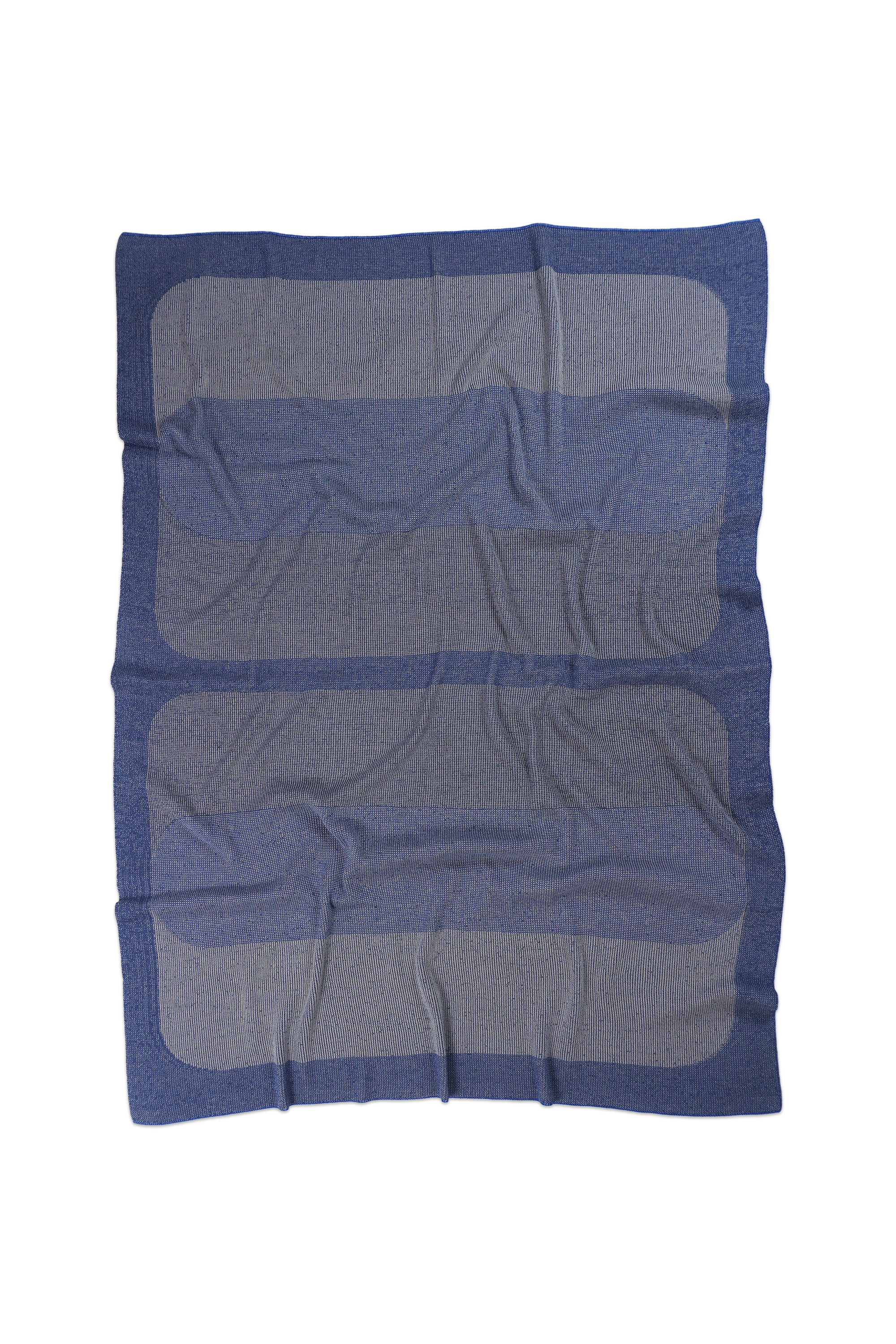 front side of grey/blue knit blanket with rectangles in merino wool and organic cotton