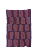 red/purple geometric knit blanket in merino wool and organic cotton
