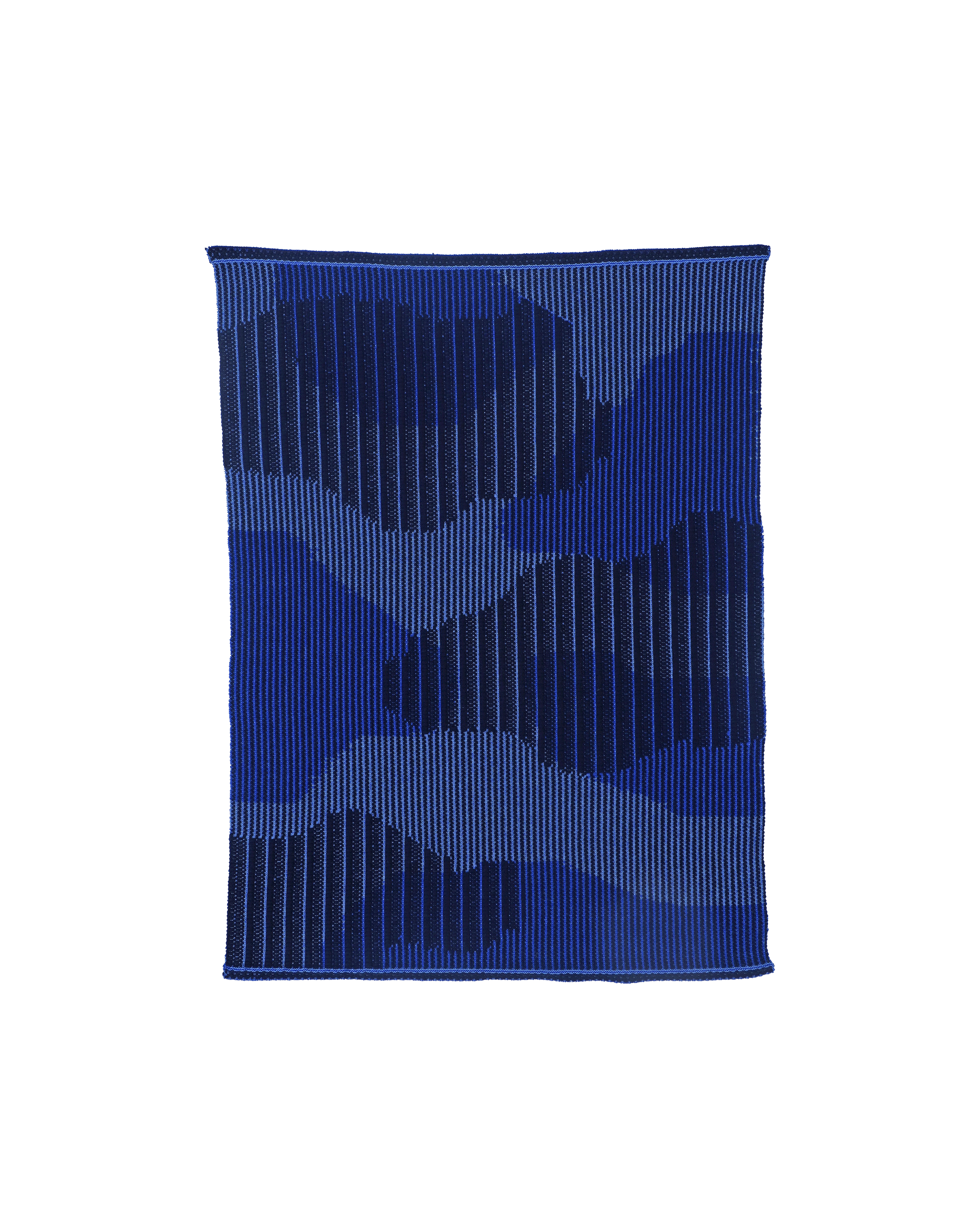 top view of blue knit organic cotton table mat with abstract design