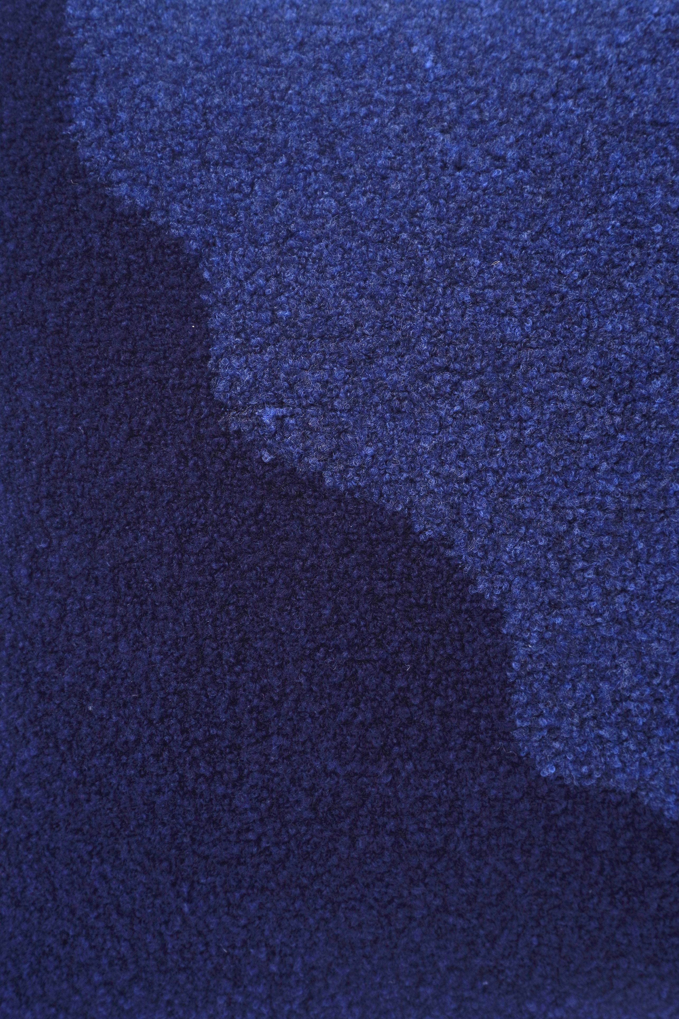 detail of blue/navy knit plush pillowcase in viscose and merino wool