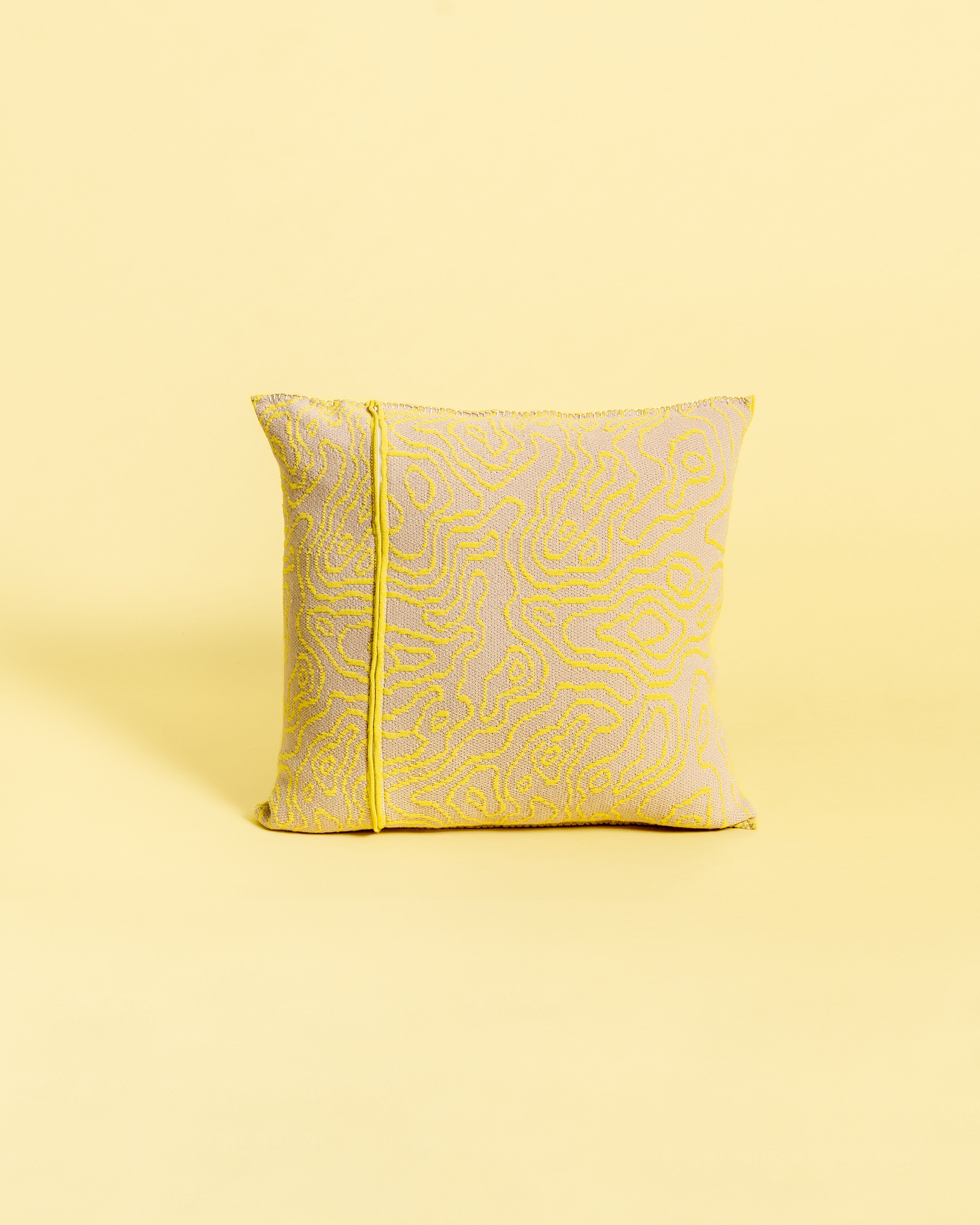 back side of yellow/beige soft viscose knit pillowcase with organic curves pattern