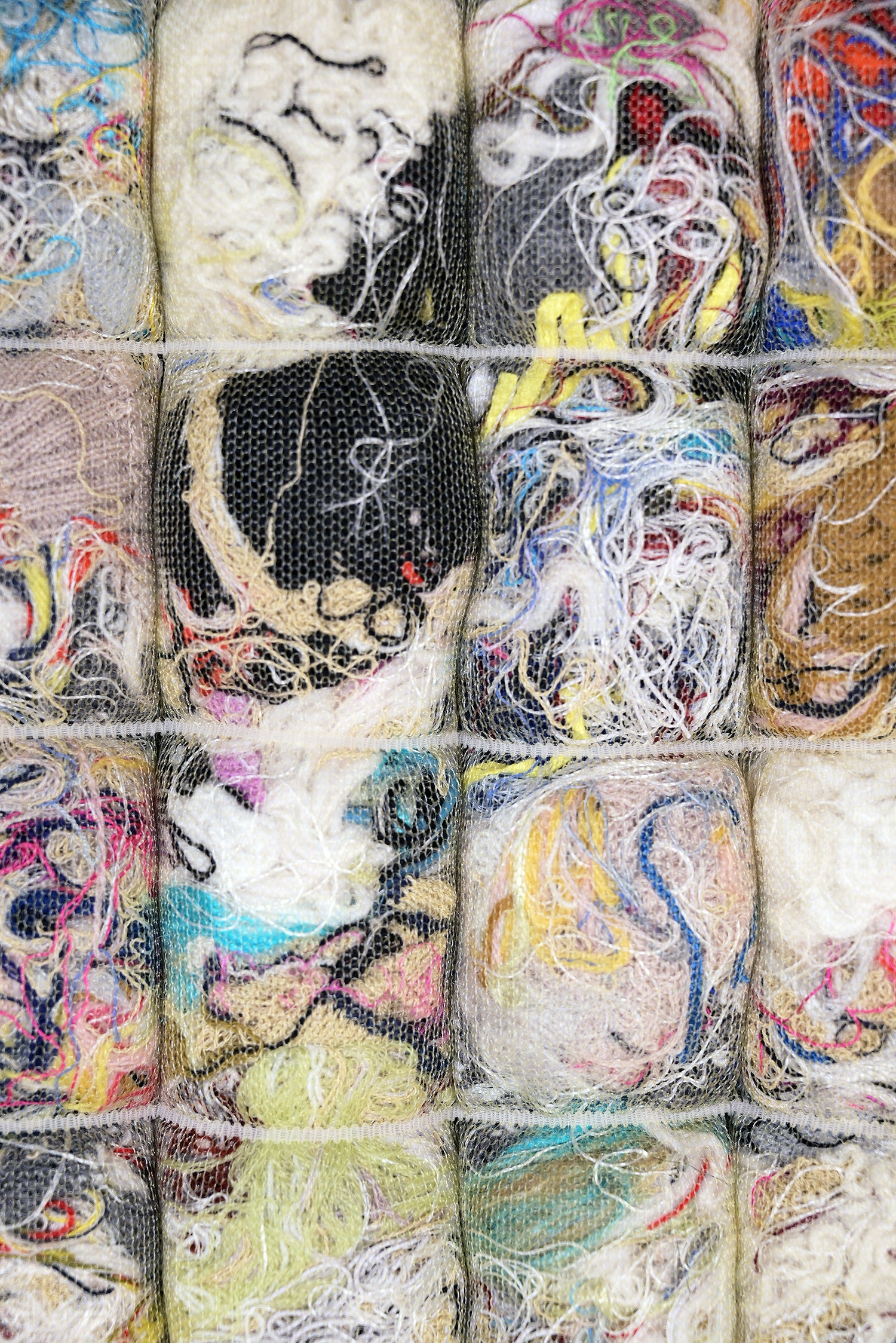 detail of knit seat cushion with transparent cover filled with upcycled materials