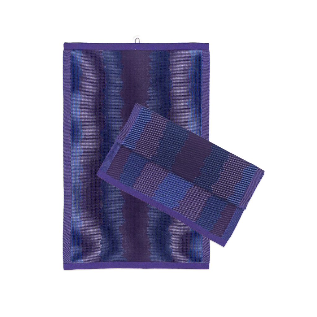 front view of purple knit organic cotton kitchen towel set with wavy pattern