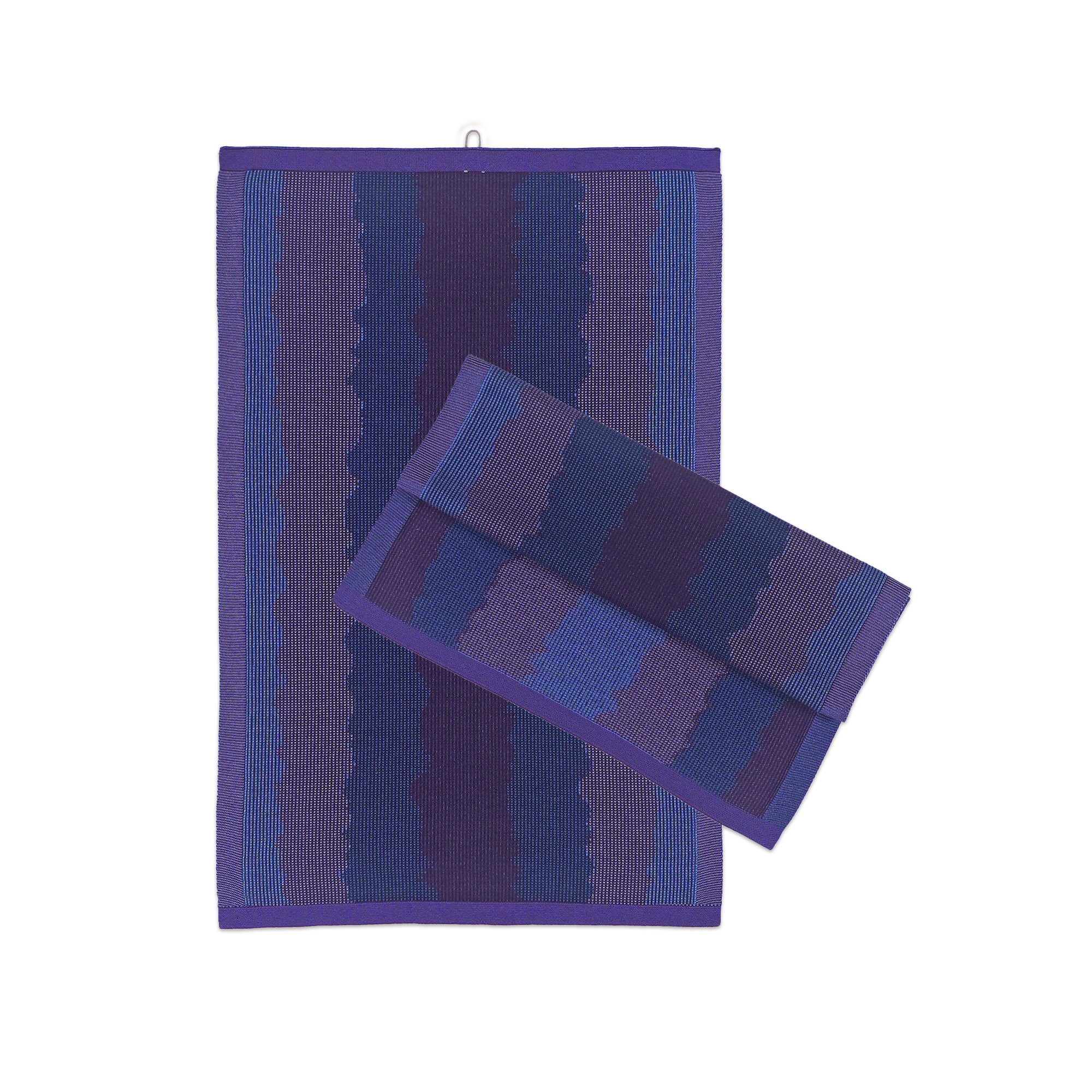 front view of purple knit organic cotton kitchen towel set with wavy pattern