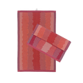 front view of red knit organic cotton kitchen towel set with wavy pattern