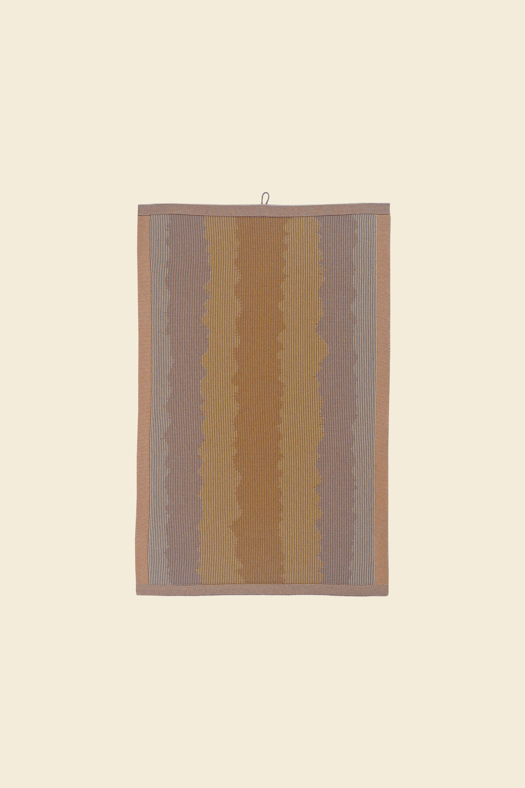 front of yellow knit organic cotton kitchen towel with wavy pattern