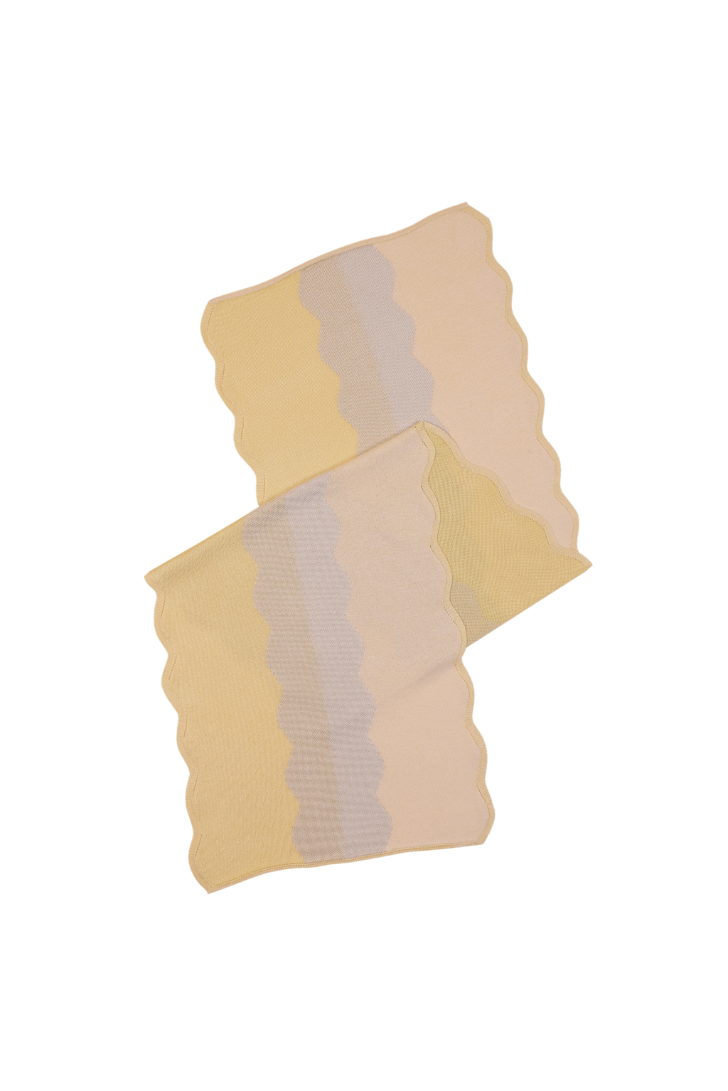 folded top view of wavy knit organic cotton table runner in yellow
