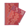 front view of red knit organic cotton kitchen towel set with zig zag pattern