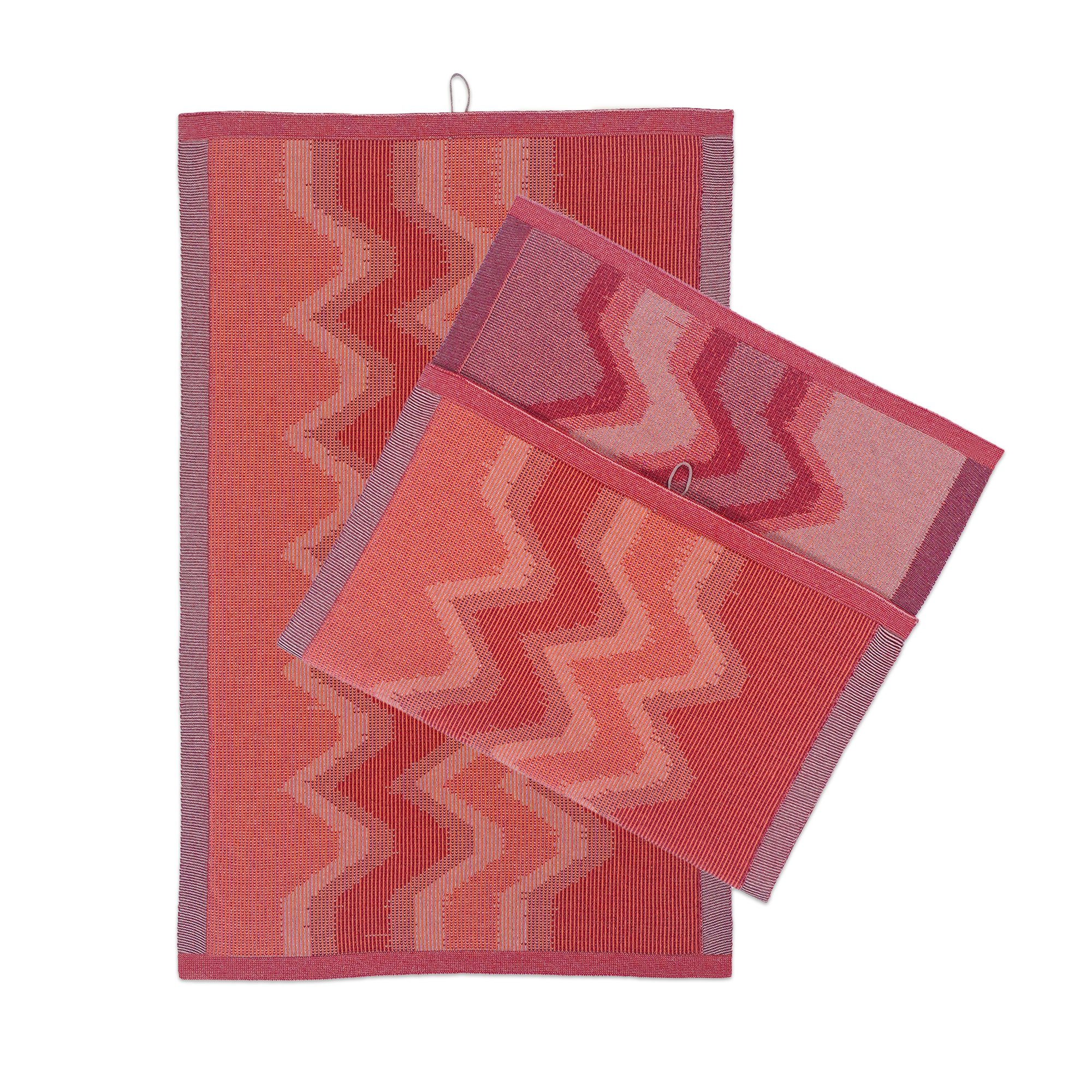 front view of red knit organic cotton kitchen towel set with zig zag pattern