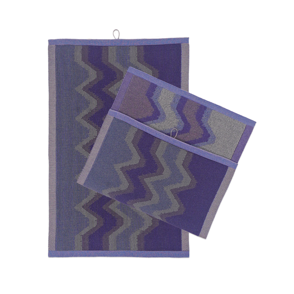 front view of purple knit organic cotton kitchen towel set with zig zag pattern